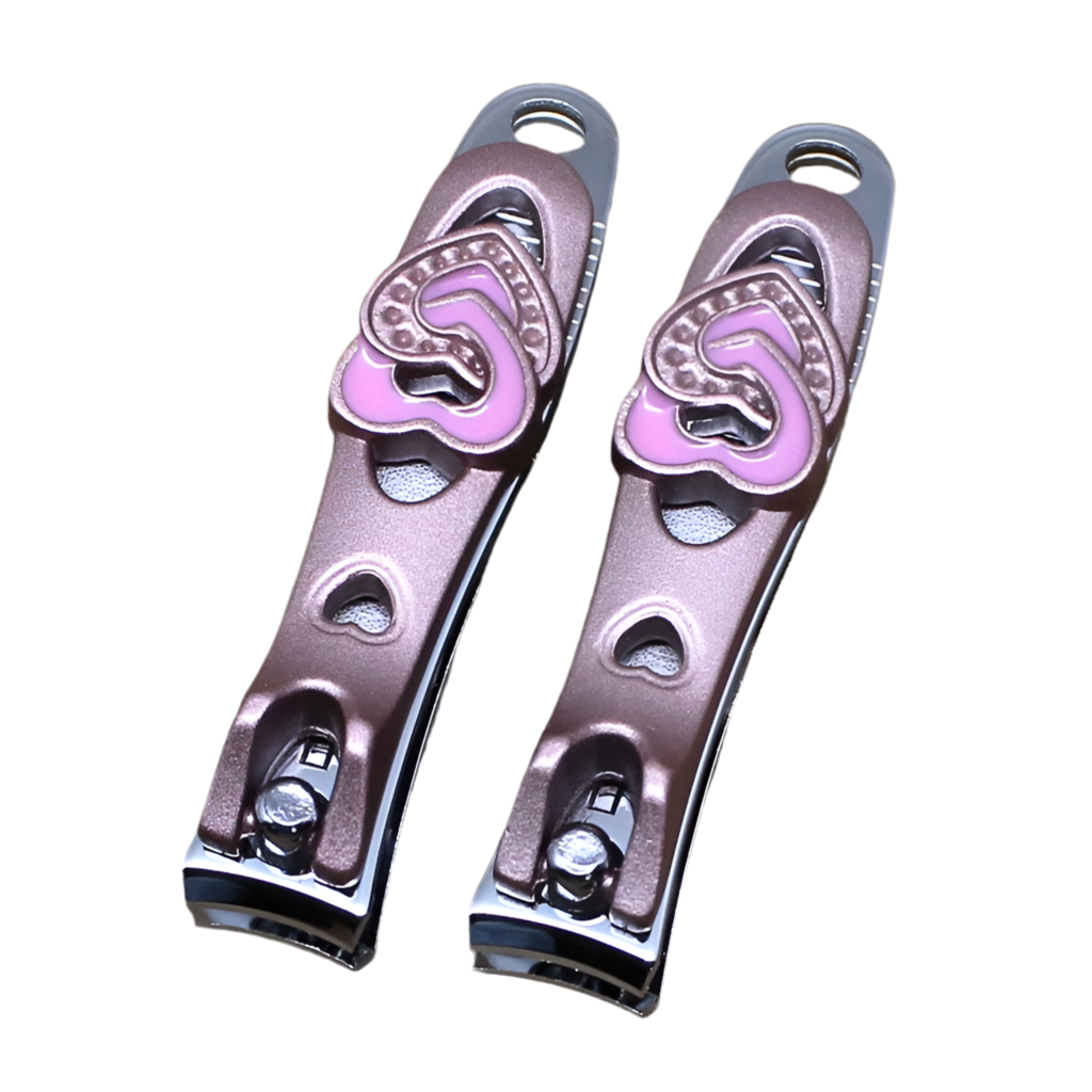 A pair of pink nail clipers with a heart and diamond design.