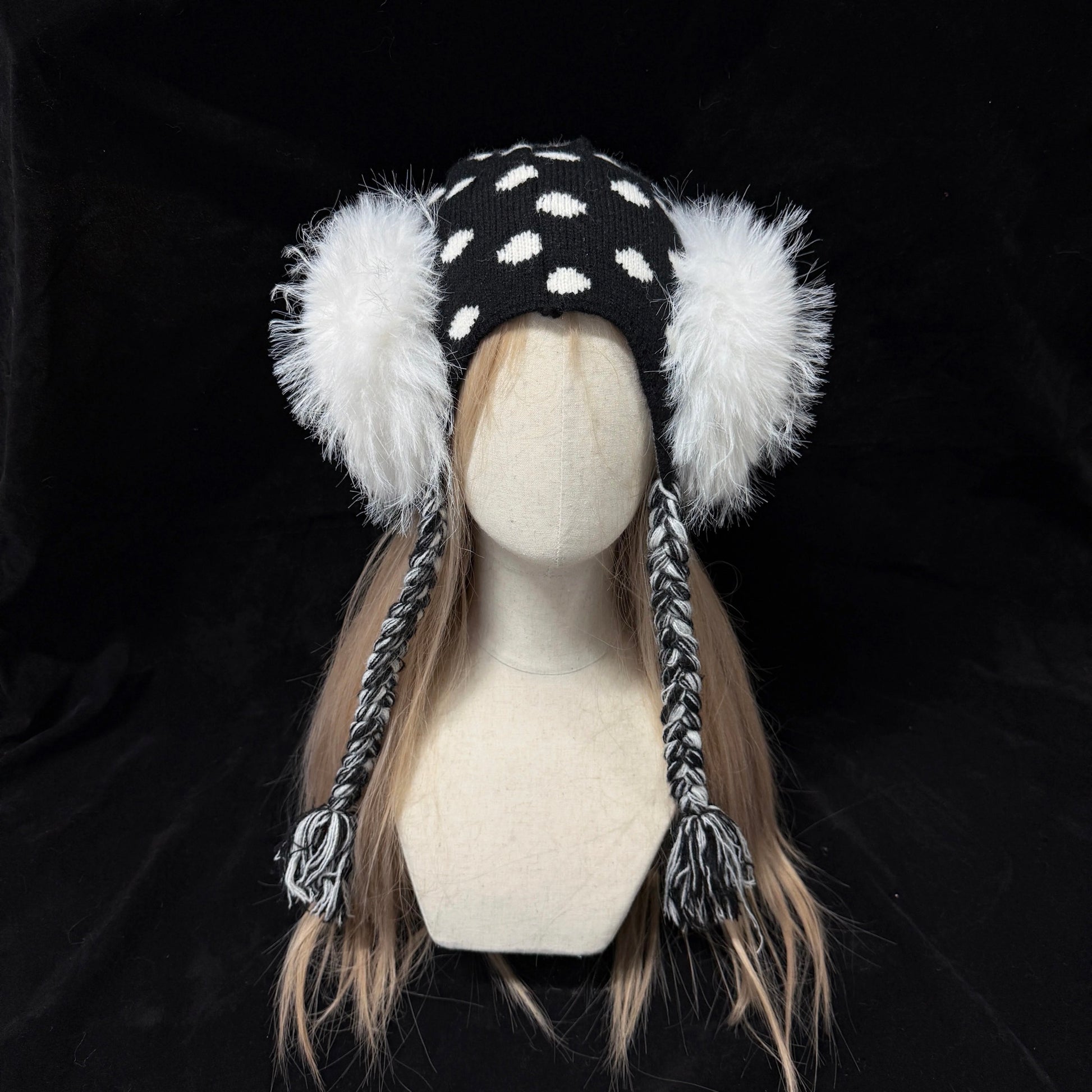 Black and white polka dot knit earflap hat with big white fur pom poms y2k aesthetic