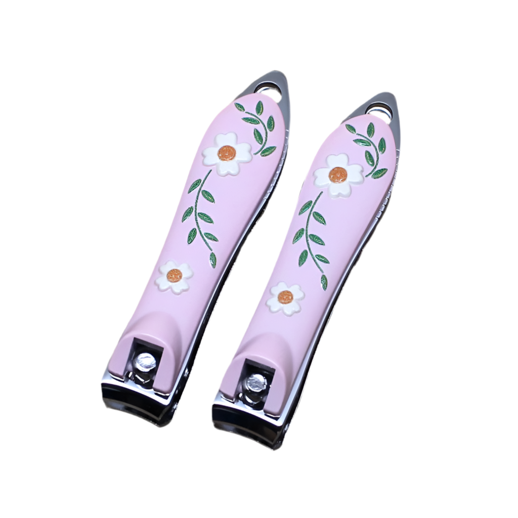 Light pink nail clipper with a floral design, featuring white flowers and green leaves on the surface.