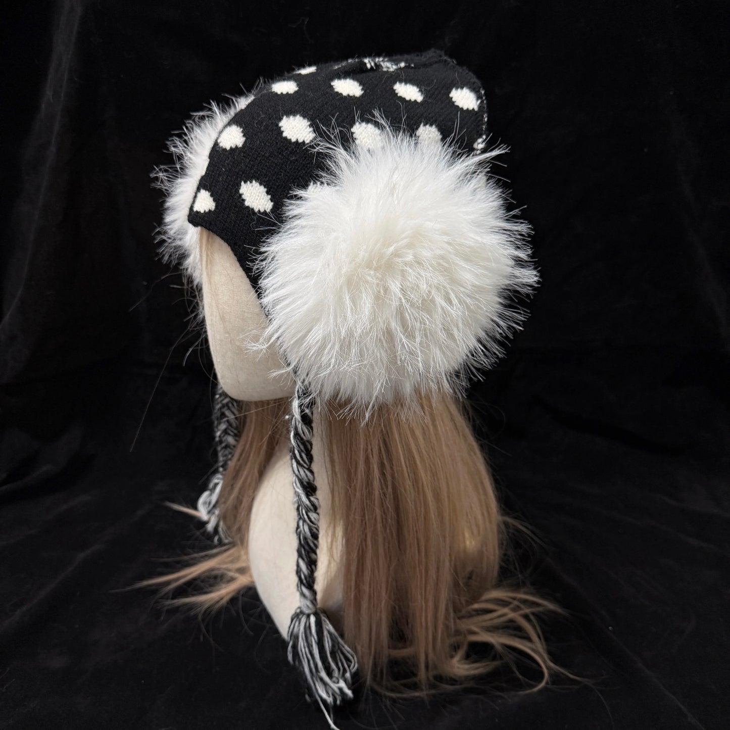 Black and white polka dot knit earflap hat with big white fur pom poms y2k aesthetic