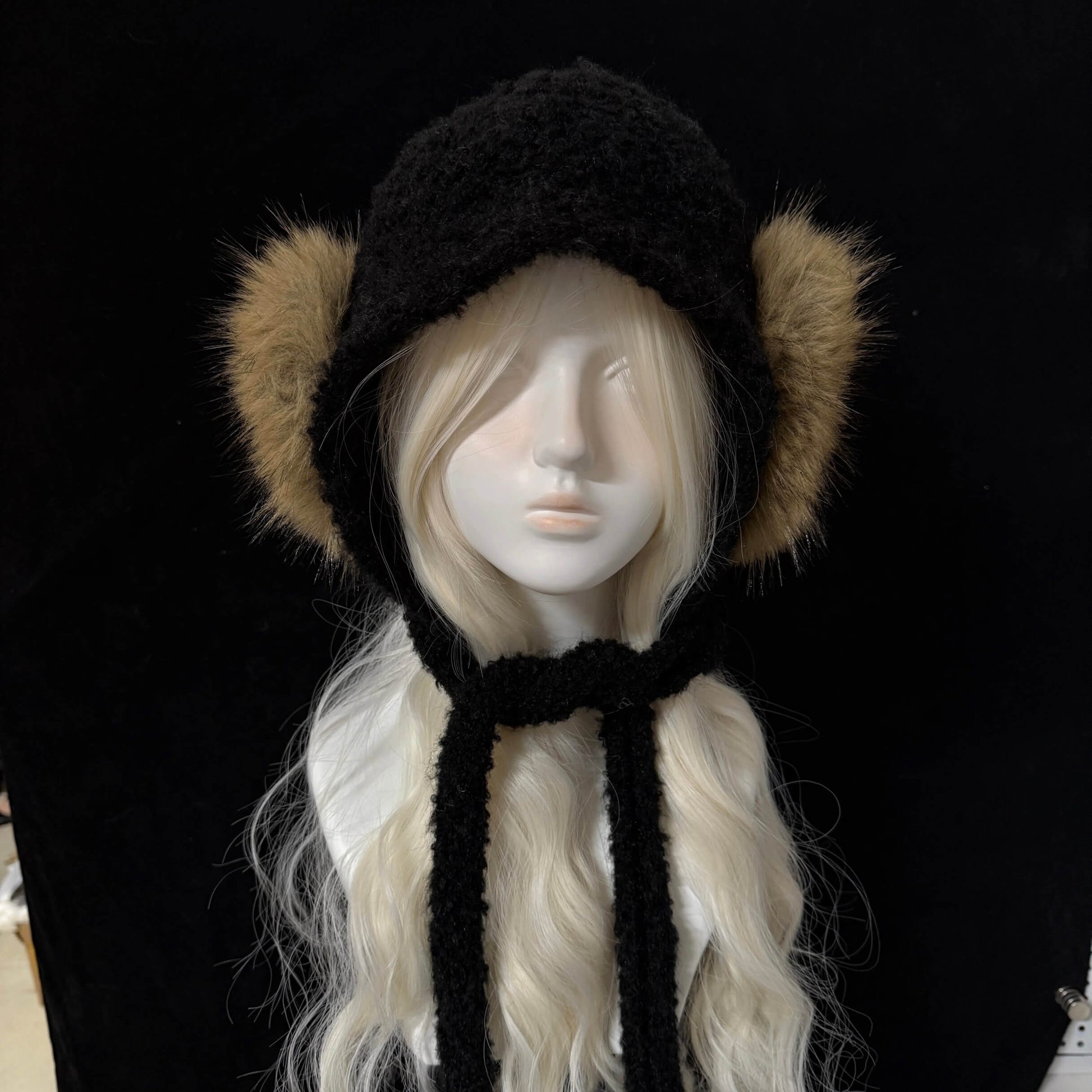 Black knit trapper hat with brown faux fur earflaps russian style winter fashion