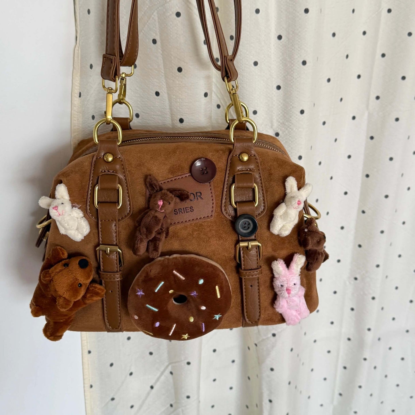 Kawaii brown faux suede backpack with 3D plushie bear, donut, and bunnies.