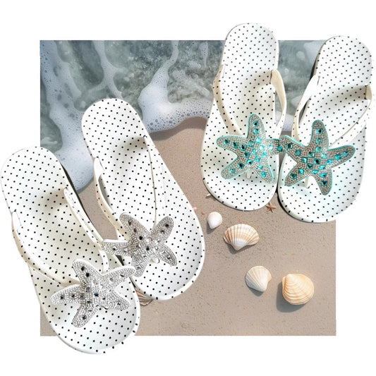White polka dot flip flops with large jeweled turquoise starfish on sand